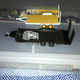 Illustration for article titled Greenlight HT GMG Ram 2500 and Heavy Duty Car Trailer